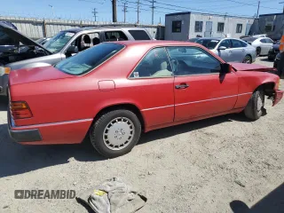 1990 Mercedes-Benz 300 CE with VIN WDBEA51D7LB137591, listed as a Copart auction lot 49811234 with 23,385 mi miles and Salvage Title. Bid and sale history available at carsss.com. Image 3.