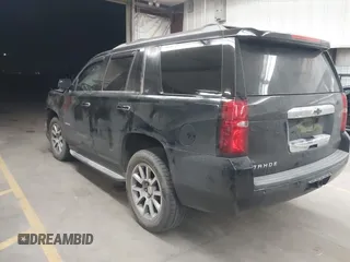 2015 Chevrolet Tahoe LT z VIN 1GNSCBKC1FR228488, wystawiony jako IAAI lot #41933869 z przebiegiem 164 523 mil mil oraz . Historia ofert i sprzedaży dostępna na DreamBid. Obrazek 3.