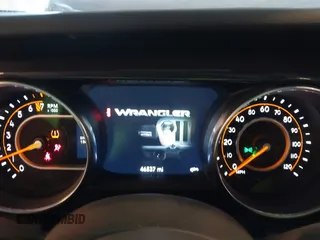 2021 Jeep Wrangler Unlimited Sport S with VIN 1C4HJXDG8MW578205, listed as a IAAI auction lot 42040105 with 46,537 mi miles and . Bid and sale history available at DreamBid. Image 7.