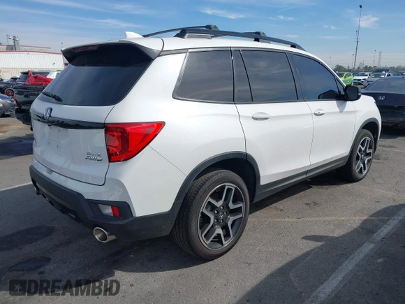 2023 Honda Passport Elite with VIN 5FNYF8H07PB010220, listed as a IAAI auction lot 41675730 with 25,128 mi miles and . Bid and sale history available at DreamBid. Image 4.