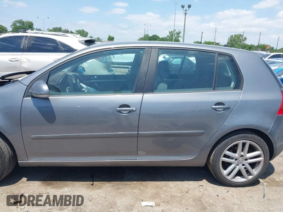 2009 Volkswagen Rabbit S z VIN WVWDA71K39W083764, wystawiony jako IAAI lot #42051848 z przebiegiem 164 403 mil mil oraz . Historia ofert i sprzedaży dostępna na DreamBid. Obrazek 14.