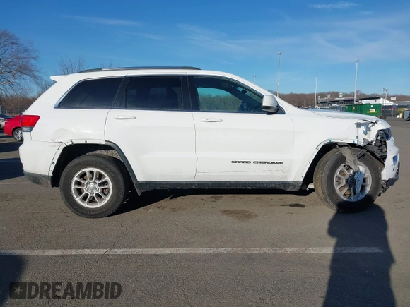 2019 Jeep Grand Cherokee Laredo E with VIN 1C4RJFAG7KC694674, listed as a IAAI auction lot 41591678 with 61,144 mi miles. Bid and sale history available at carsss.com. Image 13.