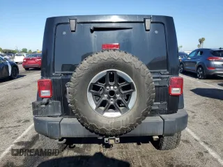 2012 Jeep Wrangler Unlimited Rubicon with VIN 1C4HJWFG9CL276753, listed as a Copart auction lot 62996995 with 234,159 mi miles and Clean title. Bid and sale history available at DreamBid. Image 6.