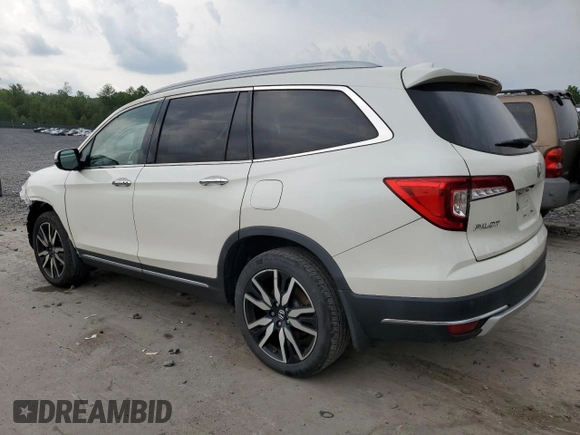 2019 Honda Pilot Touring 7-Passenger with VIN 5FNYF6H67KB005312, listed as a Copart auction lot 58785895 with 138,937 mi miles and Salvage title. Bid and sale history available at DreamBid. Image 2.