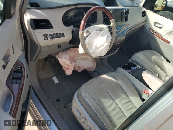 2013 Toyota Sienna XLE AAS with VIN 5TDYK3DC1DS318277, listed as a Copart auction lot 54156935 with 218,564 mi miles and Salvage title. Bid and sale history available at DreamBid. Image 8.