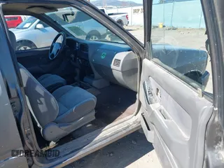 1997 Honda Passport z VIN 4S6CM58V4V4417753, wystawiony jako IAAI lot #42076610 z przebiegiem 211 410 mil mil oraz . Historia ofert i sprzedaży dostępna na DreamBid. Obrazek 5.