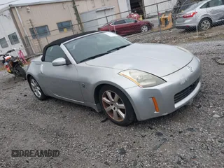 2005 Nissan 350Z Touring z VIN JN1AZ36A25M759800, wystawiony jako IAAI lot #42327063 z przebiegiem 100 940 mil mil oraz . Historia ofert i sprzedaży dostępna na DreamBid. Obrazek 1.