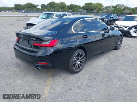 2021 BMW 3 Series 330i with VIN 3MW5R1J09M8B93600, listed as a IAAI auction lot 41735270 with 77,648 mi miles. Bid and sale history available at carsss.com. Image 4.