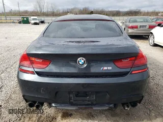 2016 BMW M6 z VIN WBS6E9C59GG437111, wystawiony jako Copart lot #44711734 z przebiegiem 79 471 mil mil oraz . Historia ofert i sprzedaży dostępna na DreamBid. Obrazek 6.