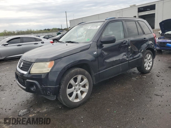 2009 Suzuki Grand Vitara z VIN JS3TE149794100133, wystawiony jako Copart lot #52919795 z przebiegiem 207 928 mil mil oraz Szkoda całkowita • Salvage title. Historia ofert i sprzedaży dostępna na DreamBid. Obrazek 1.
