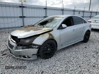 2014 Chevrolet Cruze 2LT z VIN 1G1PE5SB7E7274895, wystawiony jako Copart lot #45261144 z przebiegiem Nie podano mil oraz Szkoda całkowita • Salvage title. Historia ofert i sprzedaży dostępna na DreamBid. Obrazek 1.