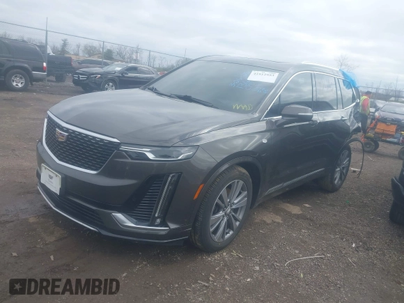2020 Cadillac XT6 FWD Premium Luxury with VIN 1GYKPCRS0LZ136228, listed as a IAAI auction lot 41912953 with Not provided miles and . Bid and sale history available at DreamBid. Image 2.