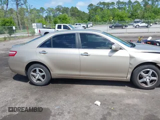 2009 Toyota Camry with VIN 4T1BE46K49U299939, listed as a IAAI auction lot 42012226 with 141,302 mi miles. Bid and sale history available at carsss.com. Image 13.