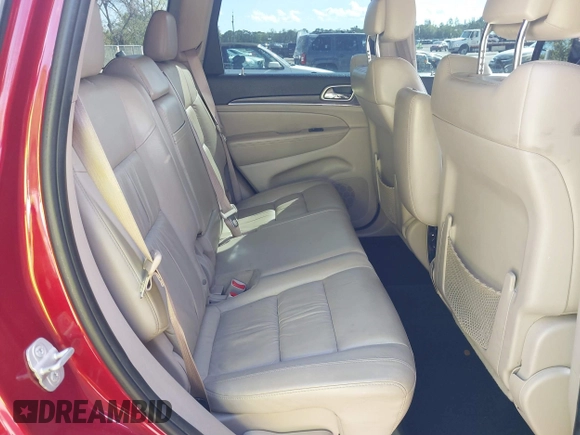 2014 Jeep Grand Cherokee Limited z VIN 1C4RJFBG4EC447633, wystawiony jako IAAI lot #41688829 z przebiegiem 109 472 mil mil oraz . Historia ofert i sprzedaży dostępna na DreamBid. Obrazek 8.