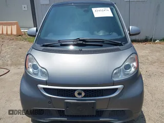 2013 Smart fortwo Pure z VIN WMEEJ3BA4DK611770, wystawiony jako IAAI lot #42432474 z przebiegiem 75 239 mil mil oraz . Historia ofert i sprzedaży dostępna na DreamBid. Obrazek 6.