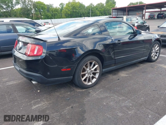 2011 Ford Mustang V6 with VIN 1ZVBP8AM5B5149026, listed as a IAAI auction lot 42551126 with 230,429 mi miles and . Bid and sale history available at DreamBid. Image 4.