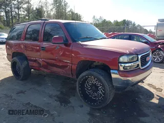 2001 GMC Yukon SLT z VIN 1GKEC13T81R150609, wystawiony jako IAAI lot #41685530 z przebiegiem 370 490 mil mil oraz . Historia ofert i sprzedaży dostępna na DreamBid. Obrazek 1.