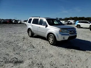 2010 Honda Pilot Touring with VIN 5FNYF3H84AB002687, listed as a Copart auction lot 80246724 with 210,934 mi miles and Salvage Title. Bid and sale history available at DreamBid. Image 12.