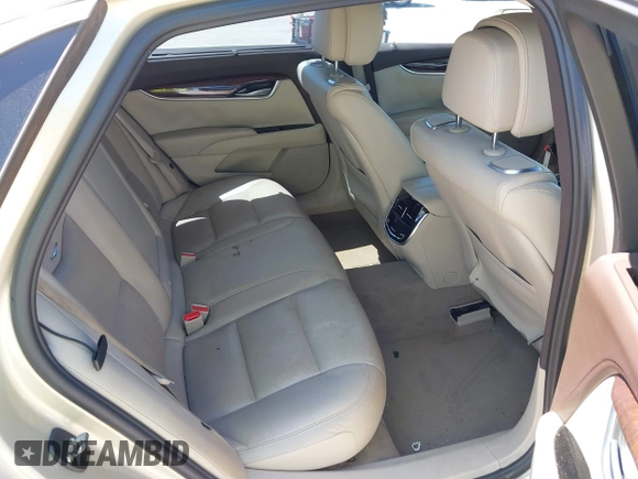 2014 Cadillac XTS Premium with VIN 2G61P5S33E9157607, listed as a IAAI auction lot 42004612 with 111,047 mi miles and . Bid and sale history available at DreamBid. Image 8.