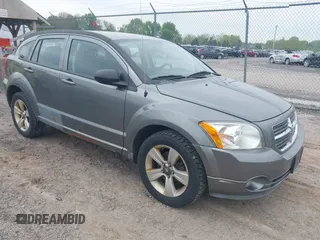 2012 Dodge Caliber SXT with VIN 1C3CDWDA5CD534457, listed as a IAAI auction lot 42197032 with 170,739 mi miles and . Bid and sale history available at DreamBid. Image 1.