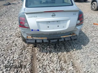 2012 Nissan Sentra S with VIN 3N1AB6AP5CL744409, listed as a IAAI auction lot 42424939 with 152,860 mi miles and . Bid and sale history available at DreamBid. Image 6.