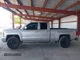 2014 Chevrolet Silverado 1500 LT with VIN 1GCRCREC0EZ110930, listed as a IAAI auction lot 42283317 with 179,628 mi miles and . Bid and sale history available at DreamBid. Image 14.