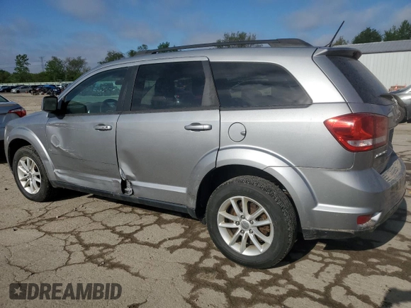 2017 Dodge Journey SXT with VIN 3C4PDCBG5HT526573, listed as a Copart auction lot 56756255 with 194,076 mi miles and Salvage title. Bid and sale history available at DreamBid. Image 2.
