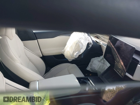 2023 Tesla Model S Plaid with VIN 5YJSA1E64PF512509, listed as a IAAI auction lot 41086678 with Not provided miles and . Bid and sale history available at DreamBid. Image 17.