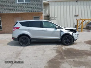 2014 Ford Escape SE with VIN 1FMCU9GX9EUD83148, listed as a IAAI auction lot 42449815 with 120,062 mi miles and . Bid and sale history available at DreamBid. Image 13.