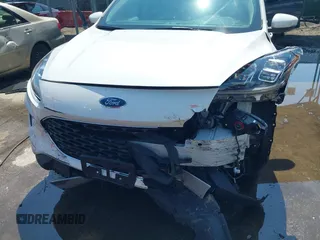 2020 Ford Escape Titanium z VIN 1FMCU9J90LUA39747, wystawiony jako IAAI lot #42369890 z przebiegiem 31 425 mil mil oraz . Historia ofert i sprzedaży dostępna na DreamBid. Obrazek 17.