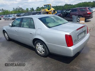 2003 Cadillac DeVille with VIN 1G6KD54Y63U115955, listed as a IAAI auction lot 41980561 with 176,624 mi miles. Bid and sale history available at carsss.com. Image 3.