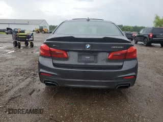 2020 BMW 5 Series M550i xDrive with VIN WBAJS7C06LCD12779, listed as a Copart auction lot 61136215 with 81,286 mi miles and Salvage title. Bid and sale history available at DreamBid. Image 6.