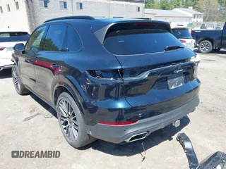 2023 Porsche Cayenne Turbo S E-Hybrid with VIN WP1AA2AY1PDA09888, listed as a IAAI auction lot 41988571 with 14,924 mi miles and . Bid and sale history available at DreamBid. Image 3.