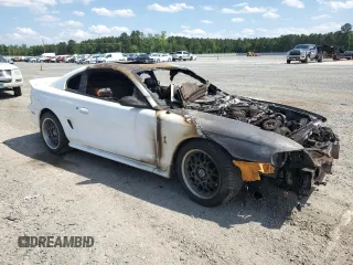 1996 Ford Mustang Cobra с VIN 1FALP47V4TF118643, выставлен на аукционе Copart как лот 57999885 с пробегом Не указан миль и Списание • Salvage title. История ставок и продаж доступна на DreamBid. Изображение 4.