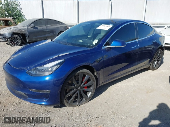 2020 Tesla Model 3 Performance z VIN 5YJ3E1ECXLF641945, wystawiony jako IAAI lot #41337826 z przebiegiem 53 336 mil mil oraz . Historia ofert i sprzedaży dostępna na DreamBid. Obrazek 2.