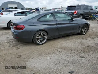 2014 BMW 4 Series 428i xDrive with VIN WBA3N5C51EF717379, listed as a Copart auction lot 59744615 with 112,800 mi miles and Clean title. Bid and sale history available at DreamBid. Image 3.