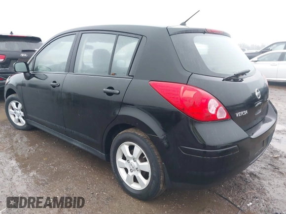 2009 Nissan Versa 1.8 SL with VIN 3N1BC13EX9L390055, listed as a IAAI auction lot 41455877 with 126,718 mi miles. Bid and sale history available at carsss.com. Image 3.