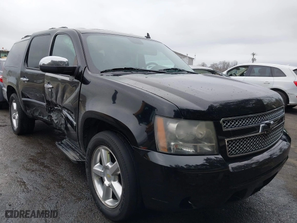 2011 Chevrolet Suburban LTZ with VIN 1GNSCKE02BR206544, listed as a IAAI auction lot 41159341 with 218,202 mi miles. Bid and sale history available at carsss.com. Image 1.