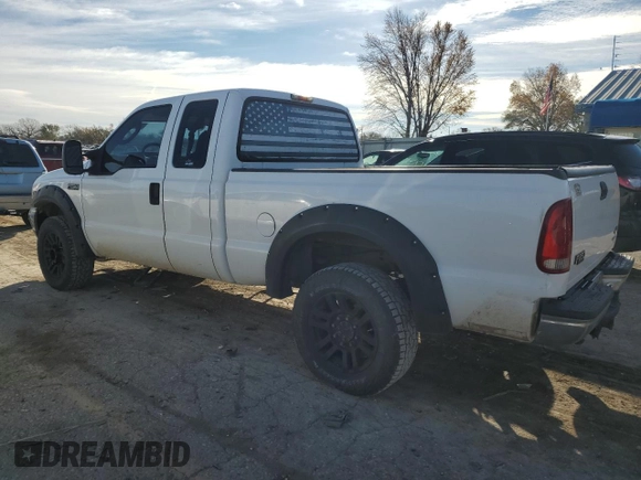 2003 Ford Super Duty F-250 XL with VIN 1FTNX20SX3EB23150, listed as a Copart auction lot 82115544 with 173,624 mi miles and Salvage Title. Bid and sale history available at carsss.com. Image 2.