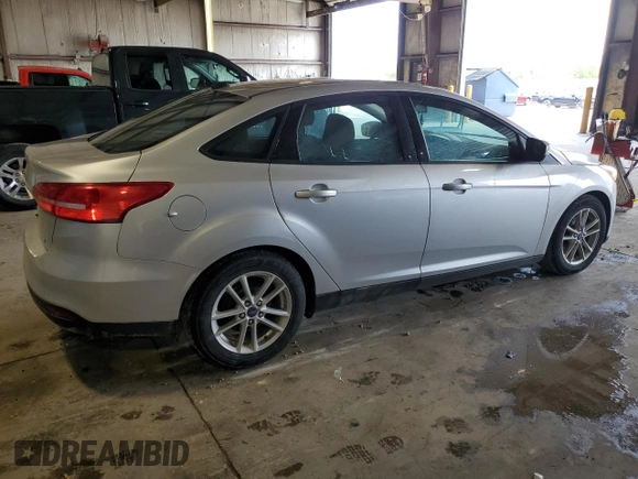 2017 Ford Focus SE with VIN 1FADP3F25HL308871, listed as a Copart auction lot 59723425 with 145,293 mi miles and Salvage title. Bid and sale history available at DreamBid. Image 3.