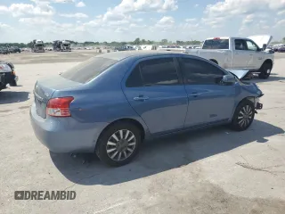 2009 Toyota Yaris with VIN JTDBT903191331207, listed as a Copart auction lot 54570165 with 232,601 mi miles and Salvage Title. Bid and sale history available at DreamBid. Image 3.