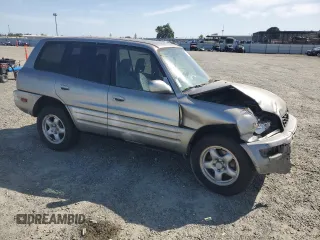 1999 Toyota RAV4 with VIN JT3GP10V5X7053634, listed as a Copart auction lot 52761695 with 236,443 mi miles and Salvage title. Bid and sale history available at DreamBid. Image 4.