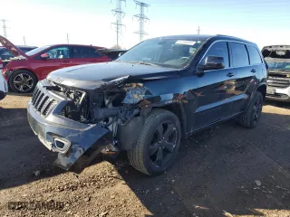 2015 Jeep Grand Cherokee Altitude with VIN 1C4RJFAG8FC767556, listed as a Copart auction lot 81266894 with 131,242 mi miles and Salvage Title. Bid and sale history available at carsss.com. Image 1.