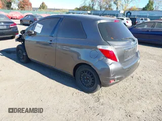 2013 Toyota Yaris L with VIN JTDJTUD33DD550976, listed as a IAAI auction lot 40691482 with 149,614 mi miles. Bid and sale history available at carsss.com. Image 3.
