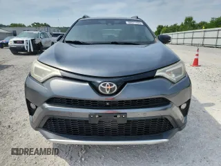 2016 Toyota RAV4 SE z VIN JTMJFREV0GD177498, wystawiony jako Copart lot #60571225 z przebiegiem 88 396 mil mil oraz Szkoda całkowita • Salvage title. Historia ofert i sprzedaży dostępna na DreamBid. Obrazek 5.