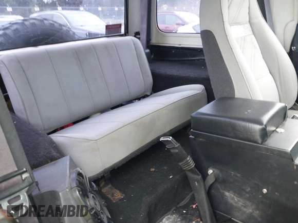 1994 Jeep Wrangler with VIN 1J4FY29S7RP474769, listed as a IAAI auction lot 42283575 with 154,422 mi miles and . Bid and sale history available at DreamBid. Image 8.