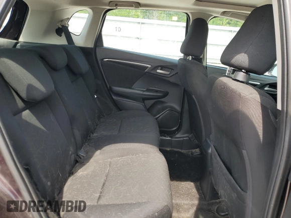 2015 Honda Fit EX-L z VIN 3HGGK5H8XFM777535, wystawiony jako Copart lot #59304185 z przebiegiem 106 393 mil mil oraz Szkoda całkowita • Salvage title. Historia ofert i sprzedaży dostępna na DreamBid. Obrazek 10.