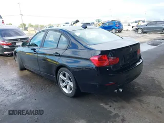 2015 BMW 3 Series 328i with VIN WBA3C1C53FK119723, listed as a IAAI auction lot 41871200 with 112,552 mi miles and . Bid and sale history available at carsss.com. Image 3.