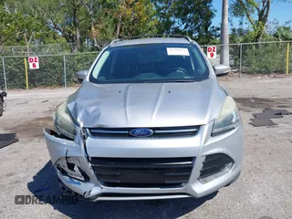 2016 Ford Escape Titanium with VIN 1FMCU0JX2GUC39416, listed as a IAAI auction lot 41793375 with 146,877 mi miles. Bid and sale history available at carsss.com. Image 12.