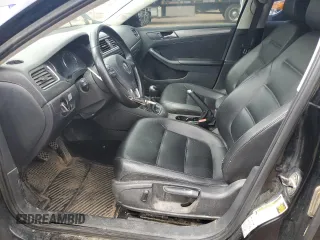 2014 Volkswagen Jetta TDI w/Premium with VIN 3VW3L7AJ9EM438697, listed as a Copart auction lot 57641645 with 191,231 mi miles and Salvage title. Bid and sale history available at DreamBid. Image 7.